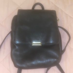Ross mini backpack . magnet close . 3 pockets with mini pockets included .